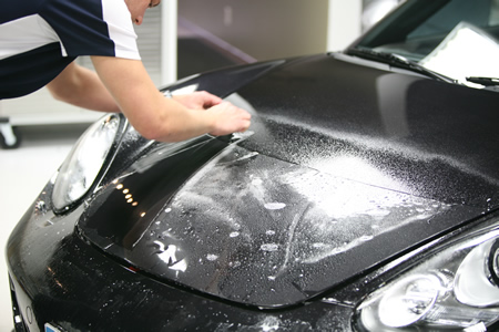 Applying paint protection film to entire hood